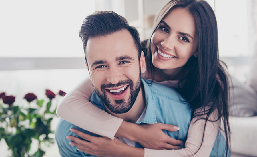 A happy couple reunited after receiving a Green Card