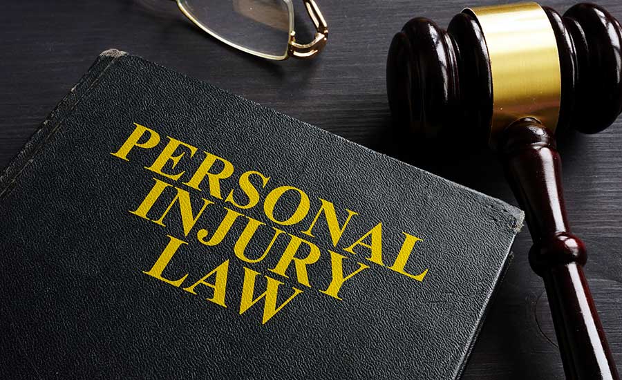 A personal injury law book and a gavel