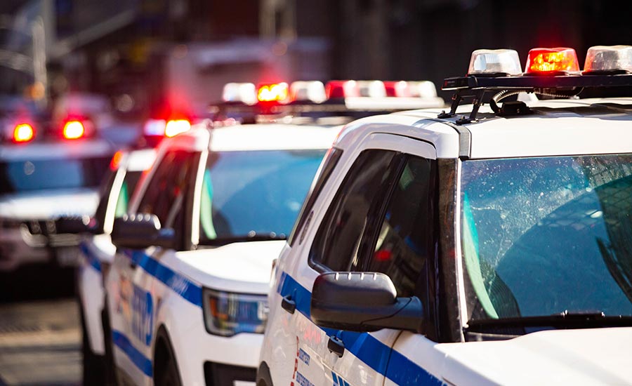 New York police cars with sirens in the street