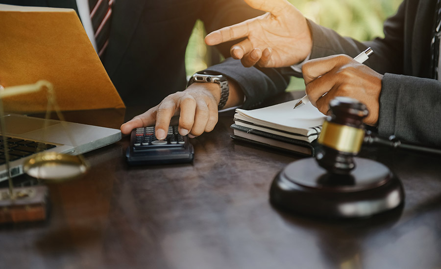 A lawyer calculating the worth of a staircase accident
