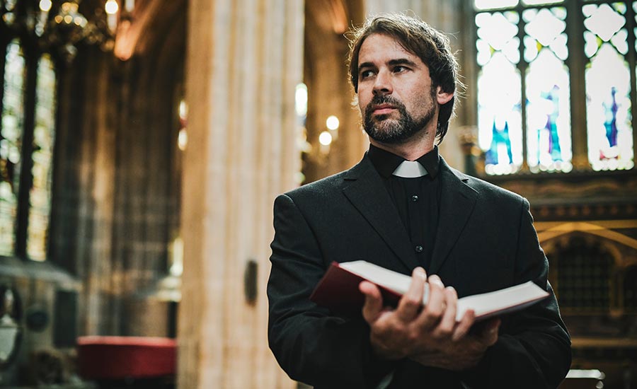 A priest by the altar