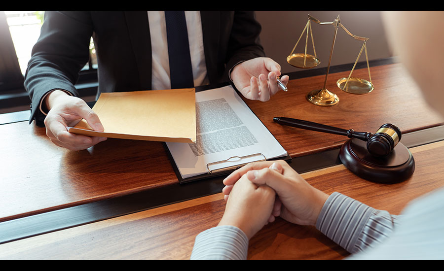 A car accident lawyer with a client​