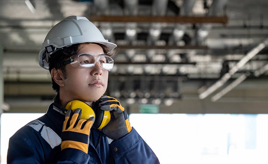 A construction worker with earmuffs​